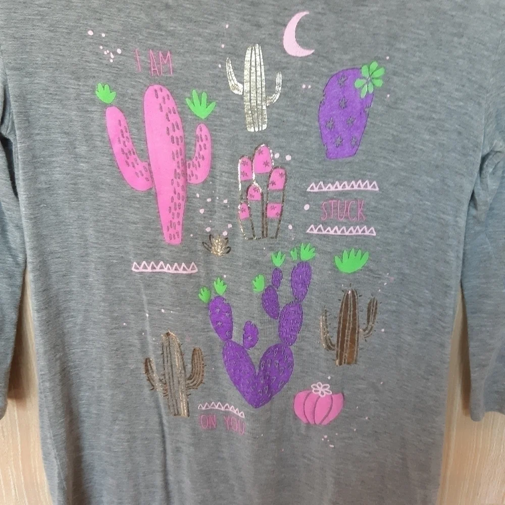 Justice Asymmetrical southwest ¾ sleeve tee shirt.